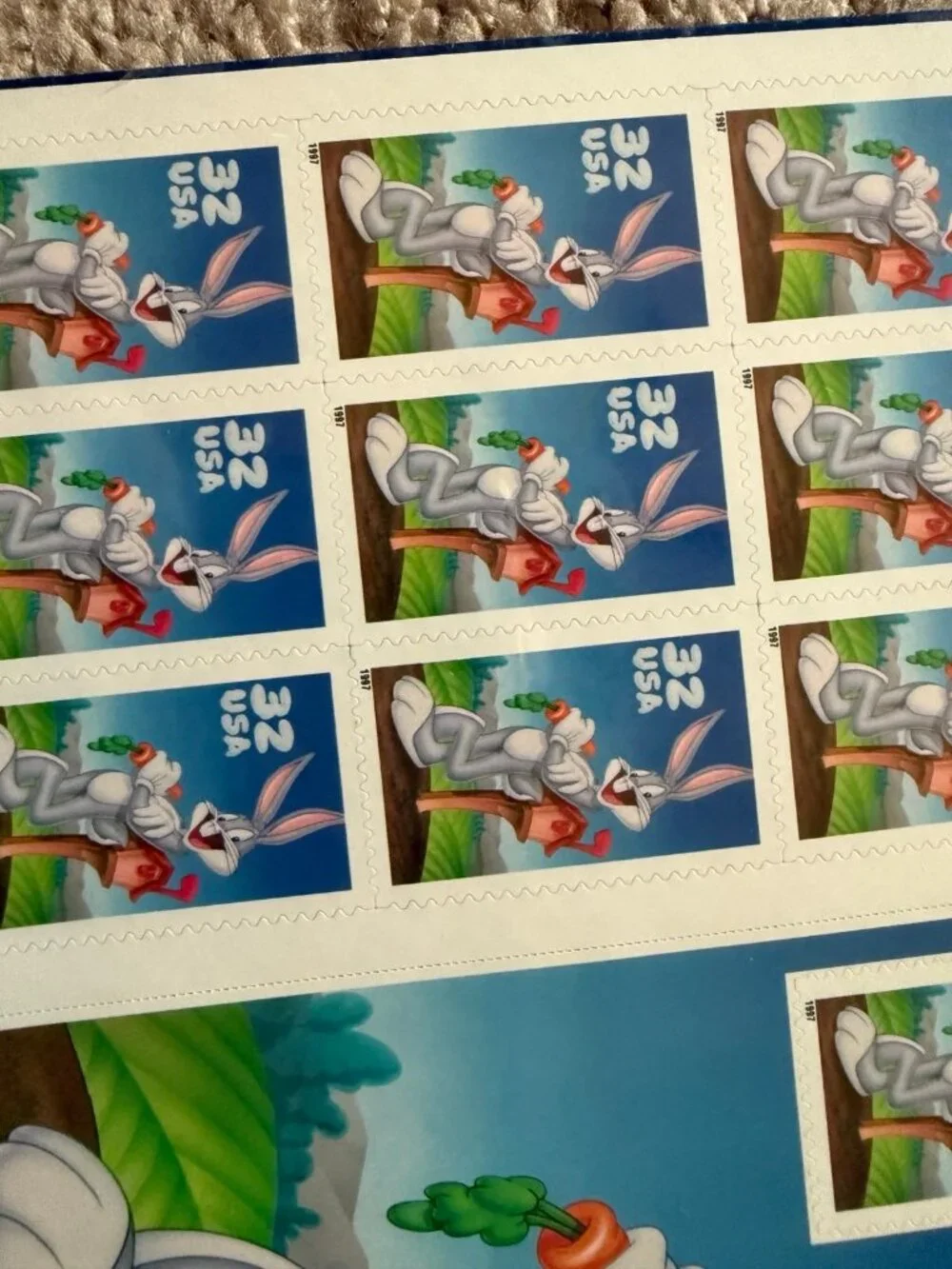 4 sheets of sealed bugs bunny stamps